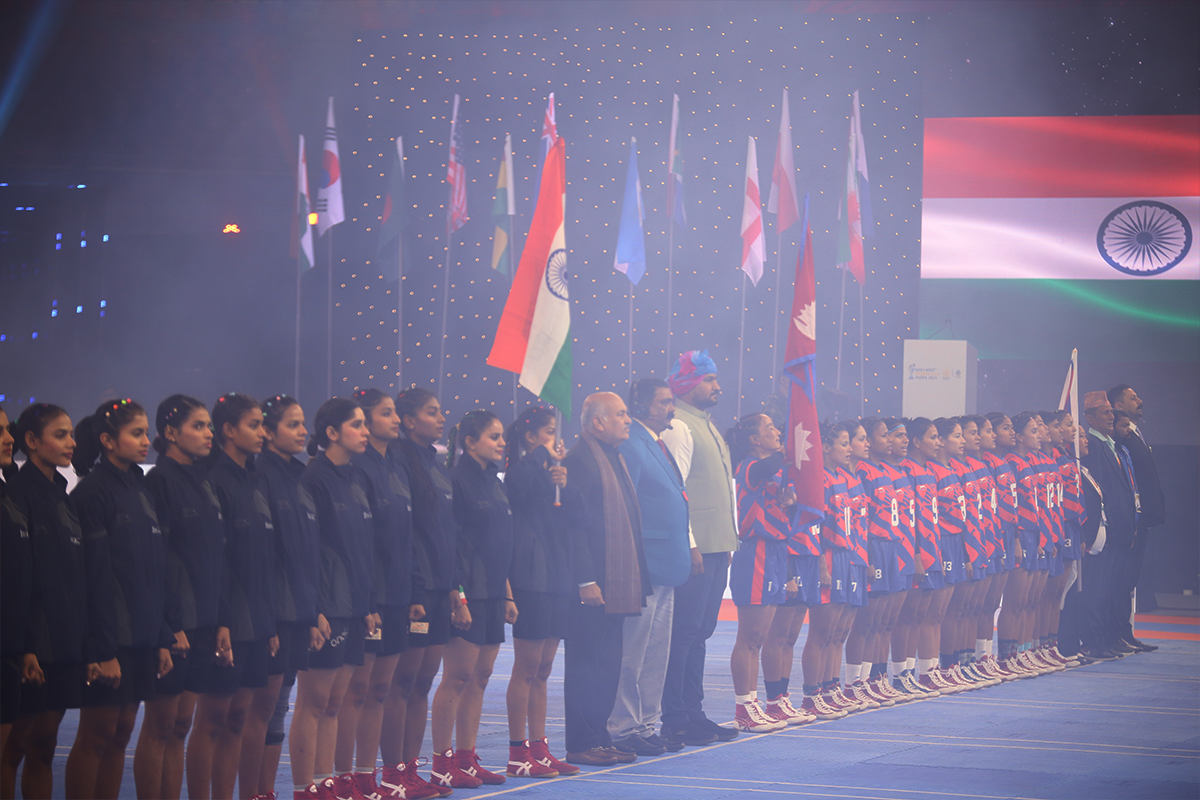 Indian women’s team stands proud during the national anthem, gearing up for the Kho-Kho final. (Photo Credit: Tejasvi Pandey)