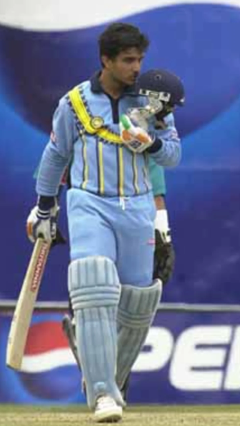 Indian skipper Ganguly with a ton.