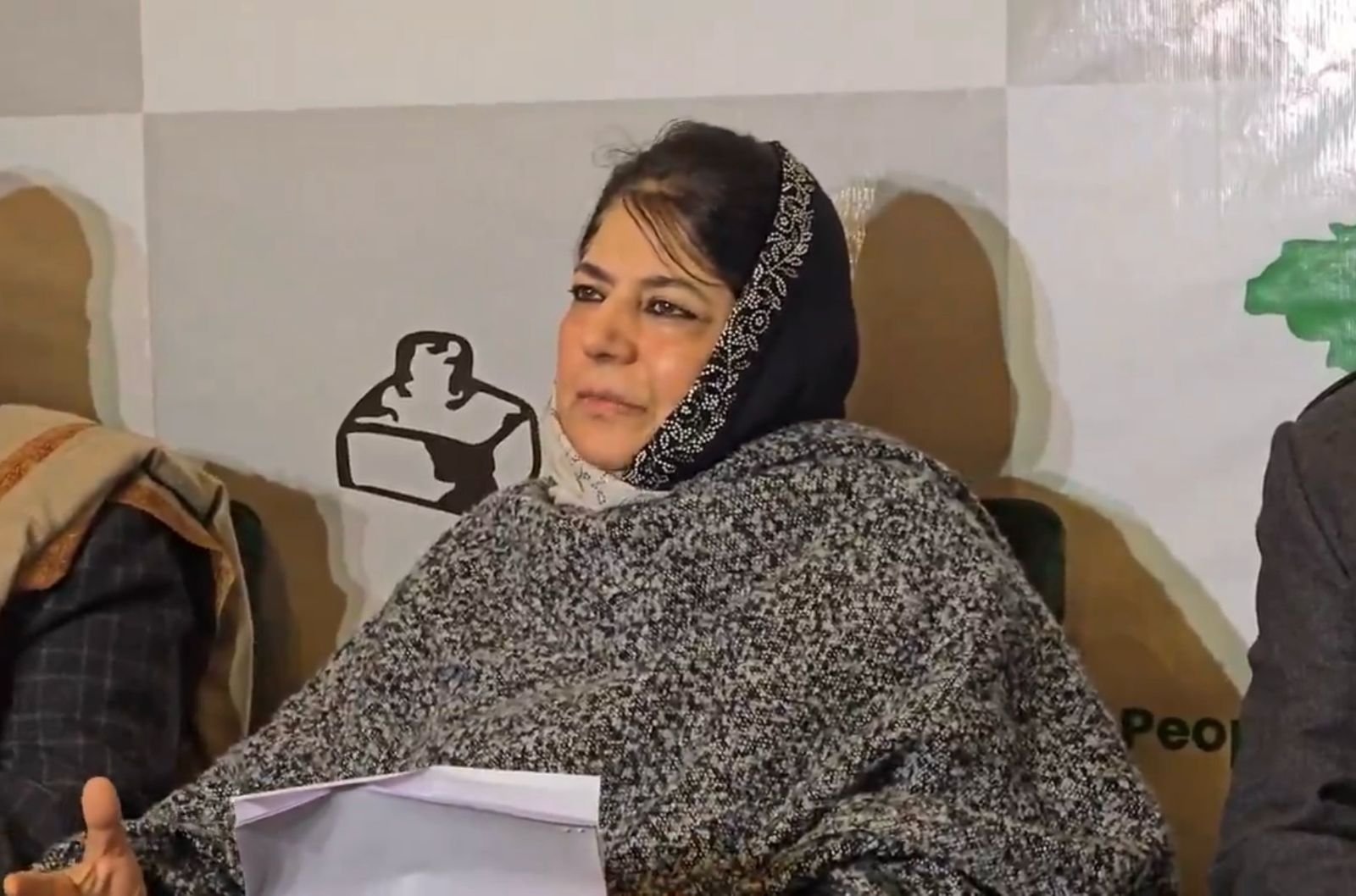 Mehbooba Mufti criticizes NC for aligning with BJP policies in Jammu and Kashmir, calls for Article 370 restoration and Martyrs' Day holiday.
